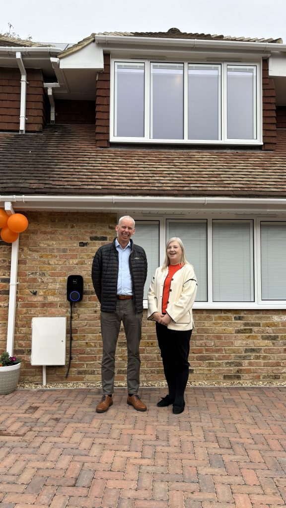 John Milne MP with Maria Mills CEO of Active Prospects standing outside the new property in Horsham