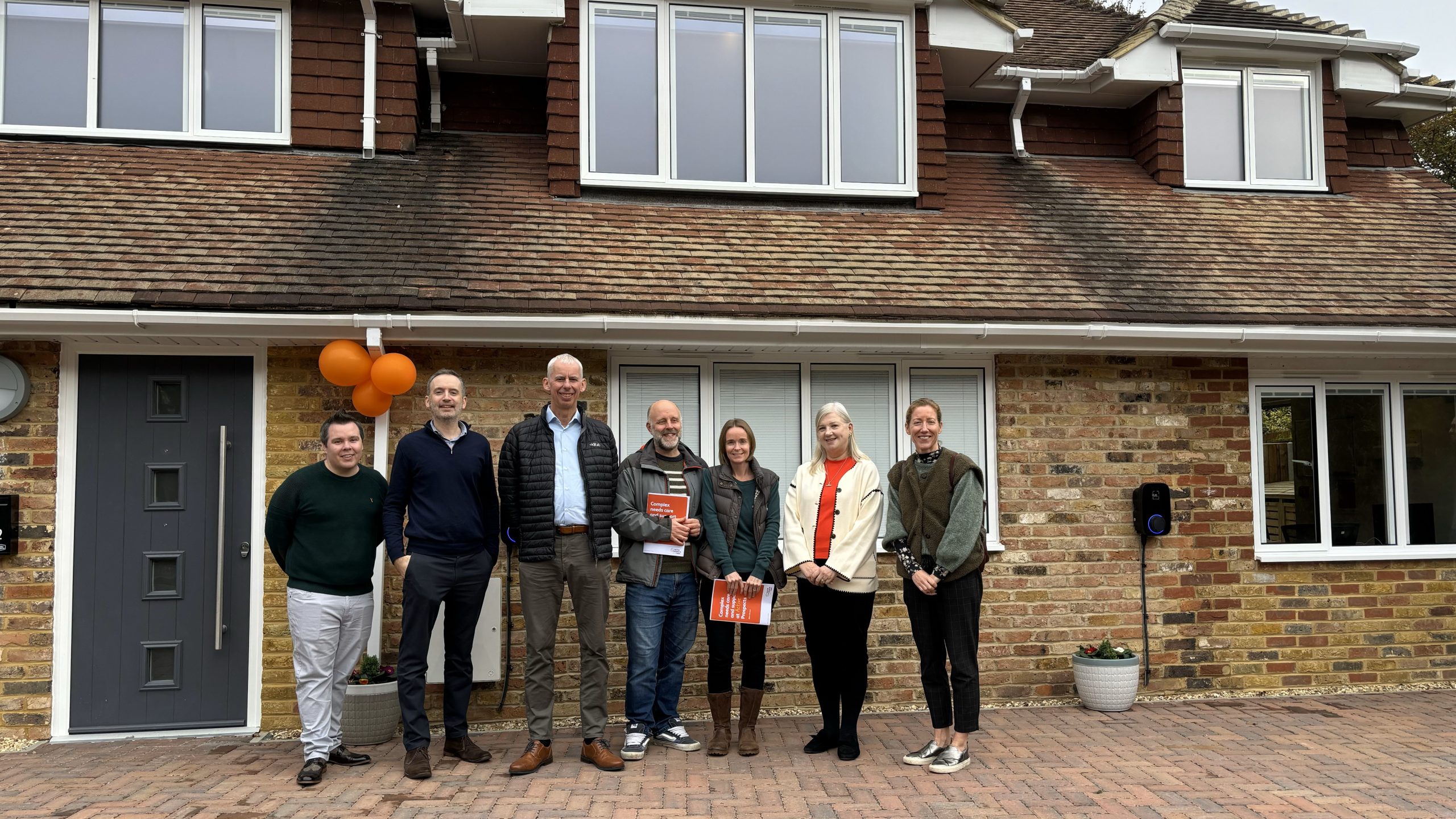 John Milne MP joins Active Prospects at unveiling of four new specialist homes in Horsham